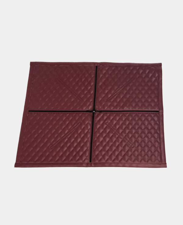 Four square quilted panels jointed to form a larger square.