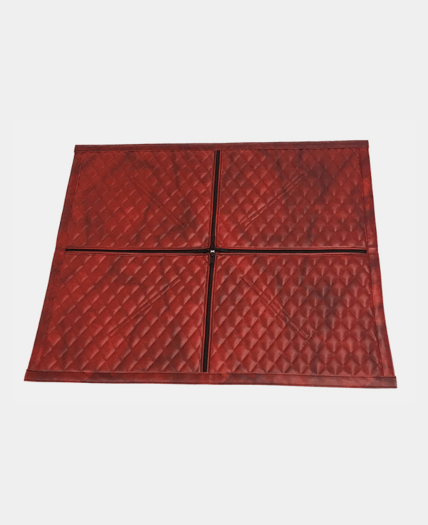 Four red interlocking floor mats arranged in a square pattern on a white background.