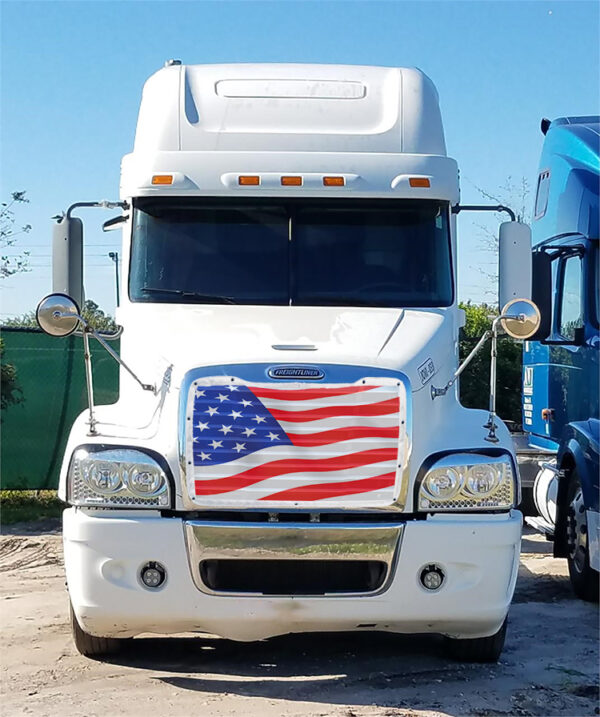 A white truck with an american flag painted on the front.