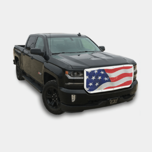 Black pickup truck with an american flag design on the grille.