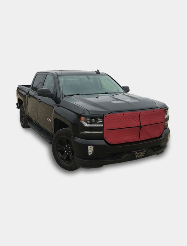 Black pickup truck with custom red grille on a white background.