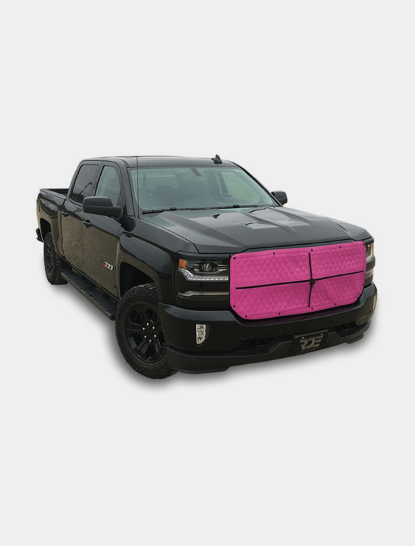Black pickup truck with a bright pink grille.
