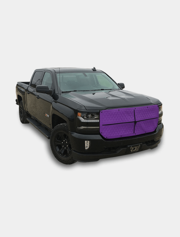 Black pickup truck with a custom purple grille.
