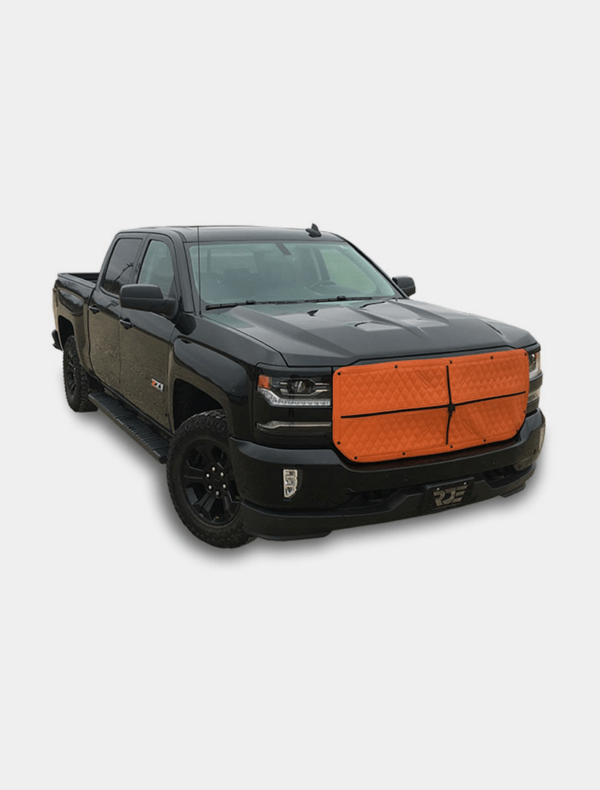 Black pickup truck with an orange snowplow attached to the front.