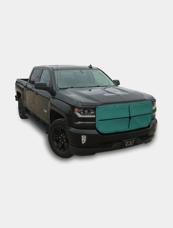 Black pickup truck with aftermarket modifications and tinted windows on a white background.