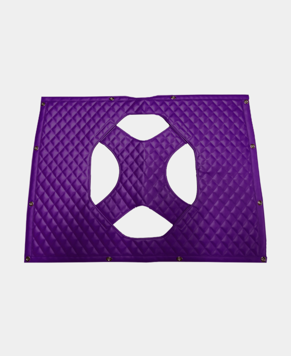 Purple quilted fabric with a cut-out geometric pattern and grommet details.