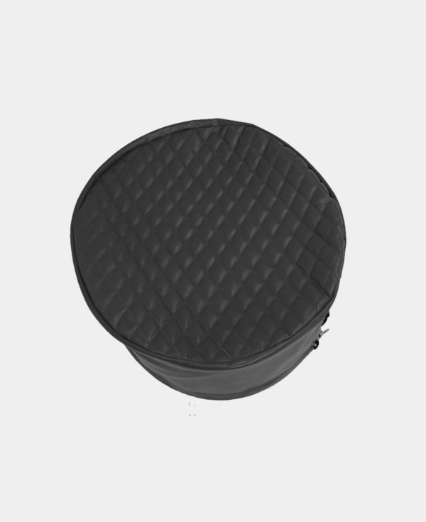 Black round quilted storage case with zipper on a white background.