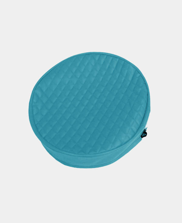 A blue, round, quilted fabric case with a zipper closure on a white background.