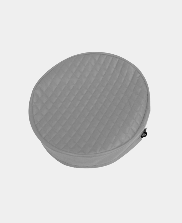 Quilted, round gray zippered case on a white background.