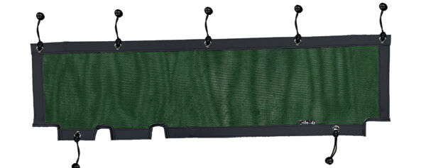 A green fence with black trim hanging on the side.