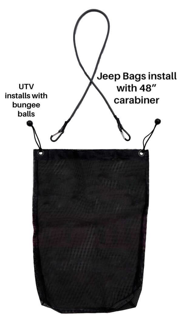 A black bag hanging from the side of a jeep.