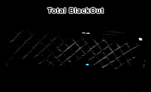A dimly lit chain-link fence against a dark background with the ZenEclipse CAR/VAN/SUV/PICKUP TRUCK Window Covers at the top.