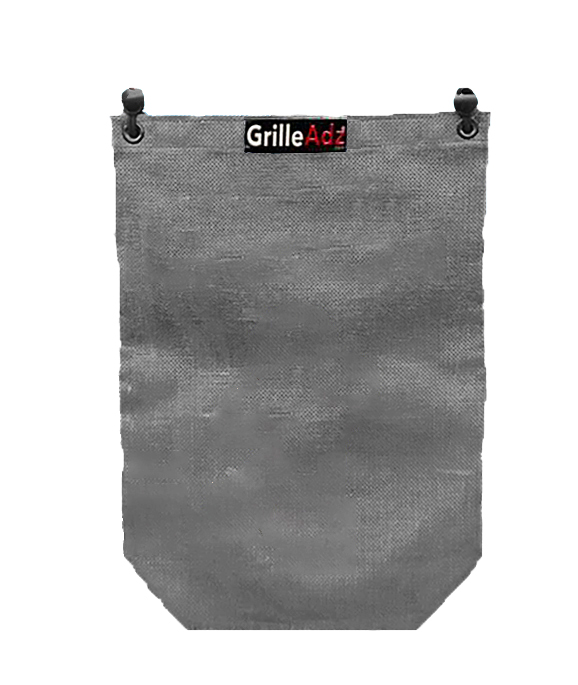 A gray bag hanging on the side of a wall.