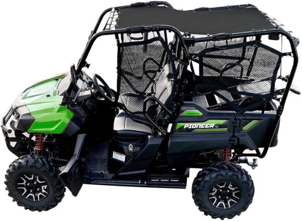 A green and black utility vehicle with a canopy.