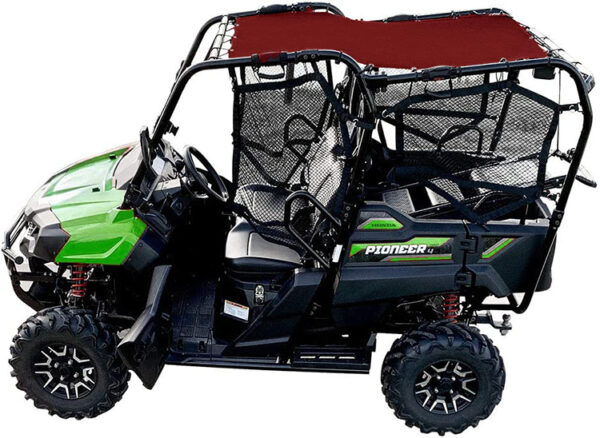 A green and black utility vehicle with a red top.