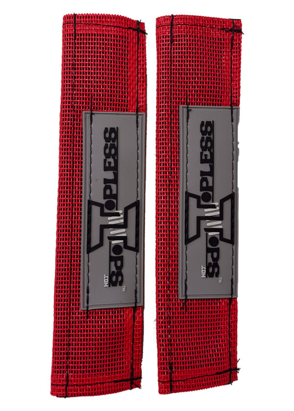 A pair of red straps with grey and black logos.