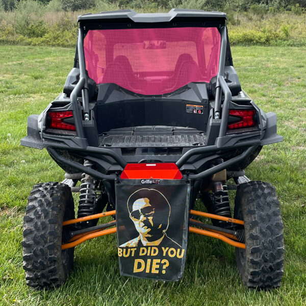 Here's an alt tag for the image: Off-road vehicle with "But did you die?" banner.